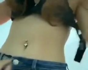 young girl taking off clothes