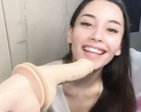 Aria Lee sucks a dildo